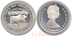 Канада. 1 доллар 1985 год. 100 лет национальному парку Канады - Банф. Лось.